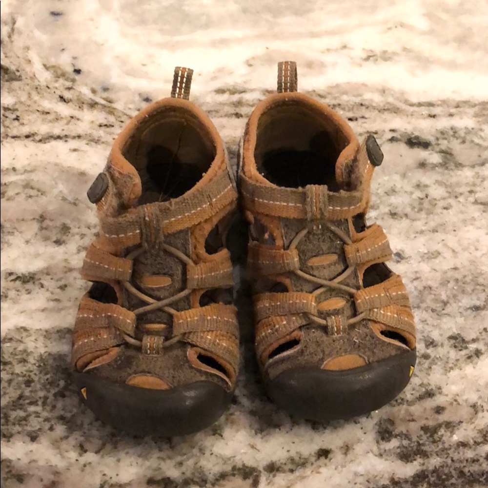 Brown little boy Keens